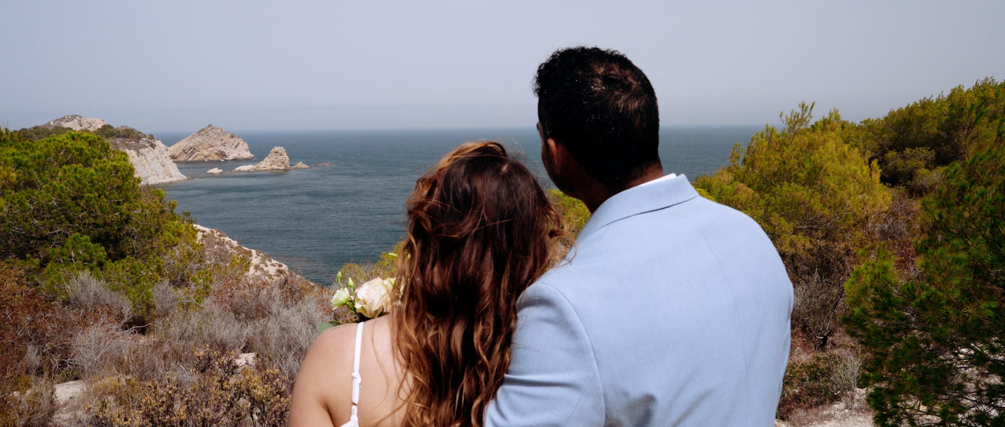 Overlooking the Mediterranean, this couple’s elopement captures serenity and wonder. Filmed by Stories by DJ, an elopement videographer guiding couples to breathtaking secret spots across Spain.